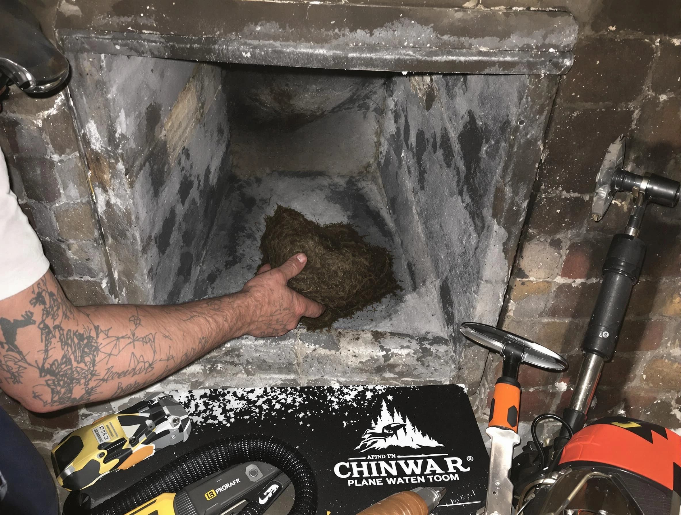 Hyrum Chimney Sweep safely removing debris and screening chimney in Hyrum, UT